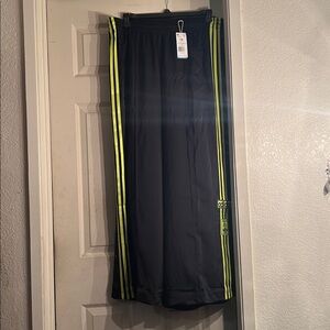adidas Black wide leg pant with Yellow Stripe Logo